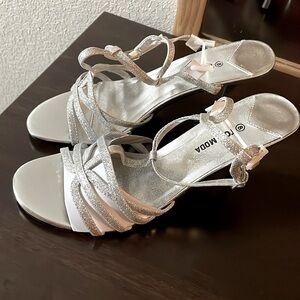 Very nice Silver strap inch heel size 8
